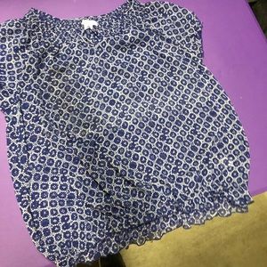 Sheer blouse with blue tank